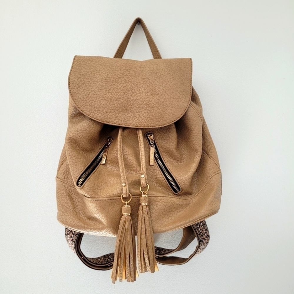 Kenzie brown backpack purse with embroidery detailing and tassels